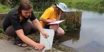 Volunteers taking water quality Samples